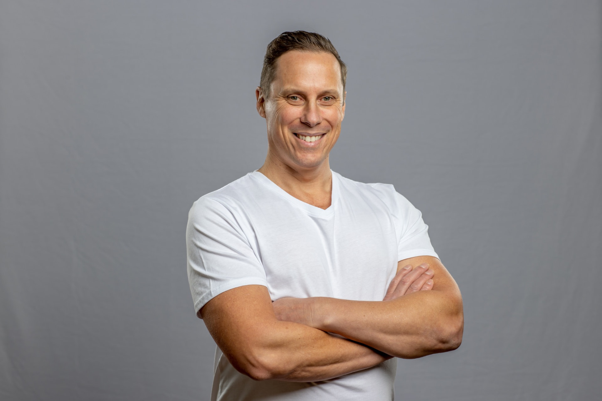 Cam Roberts, arms crossed